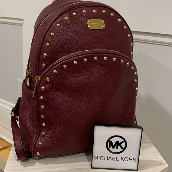 Michael Kors Handbags - Michael Kors Abbey Pebbled Soft Leather Gold Studded Backpack EUC